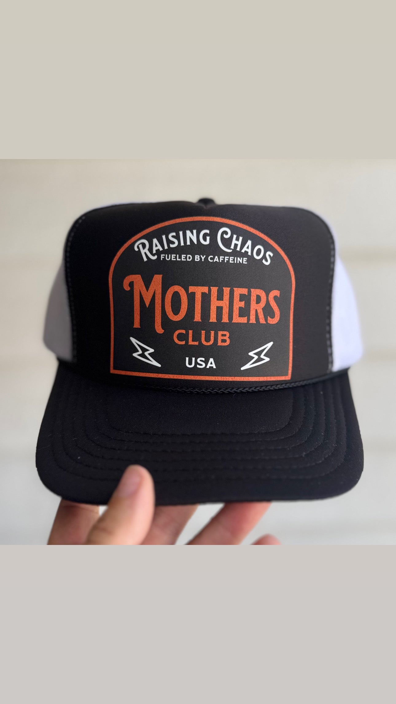 Raising chaos Trucker hat