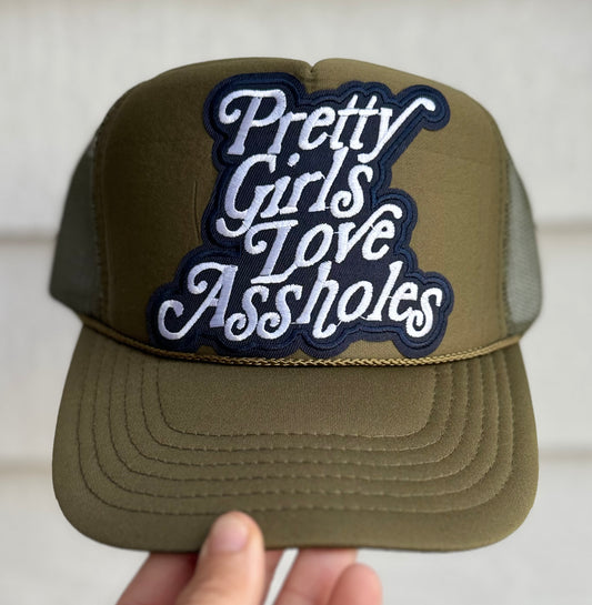 Pretty girls loves assholes trucker hat